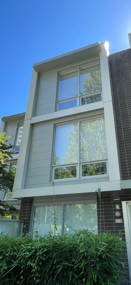 Exterior windows on a three-storey strata townhouse